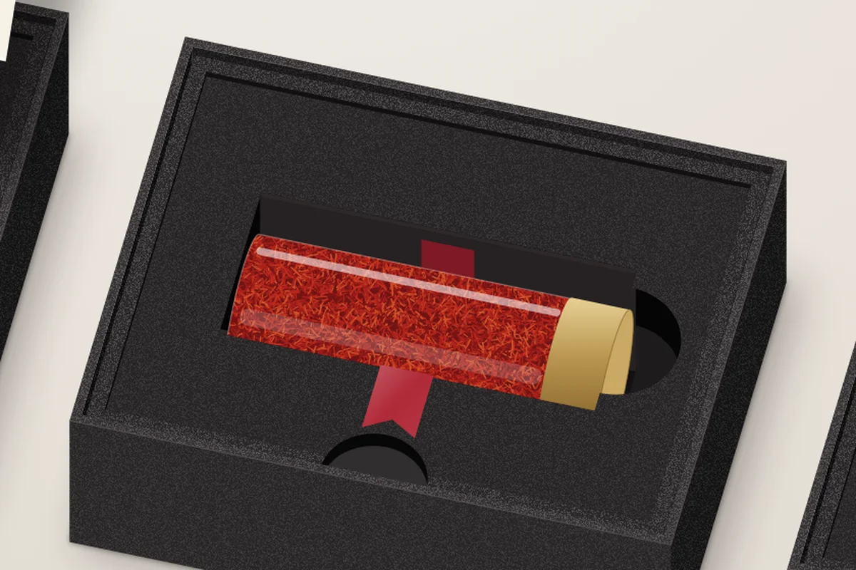 The open box with the saffron vial in its cradle